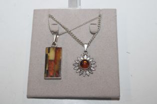 Two Sterling silver and amber necklaces
