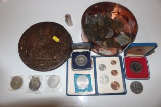 A tin in the form of a penny and contents of vario