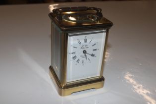 A French brass cased L'Epee carriage clock
