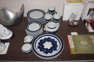 A collection of "Arabia" pattern Finnish dinner an