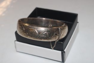 A 1961 Birmingham silver Harrods Stores Ltd bangle