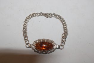 A vintage Sterling silver and amber bracelet, appr