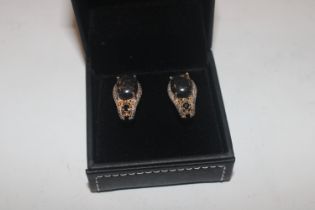 A boxed pair of silver and amber ear-rings