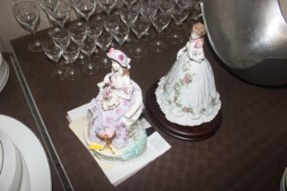 A Royal Worcester figurine "Queen of Hearts" and a