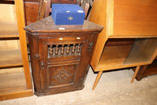 A Jacobean revival corner cupboard