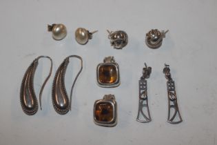 Five pairs of silver ear-rings