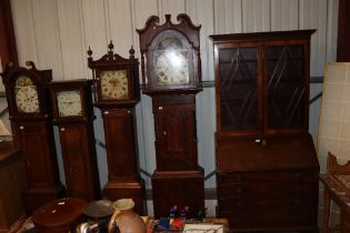 A 19th Century mahogany long case clock having pai