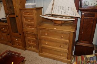 A modern pine chest fitted three drawers and a pai