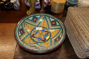 A pottery bowl with geometric design