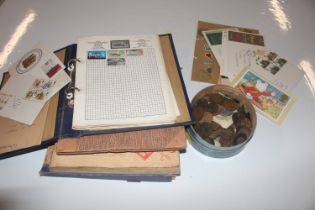 A collection of albums containing stamps, match bo