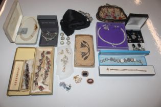 A box containing various costume jewellery; and an