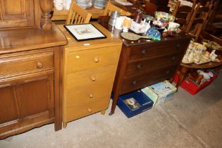 A bedside chest fitted four drawers