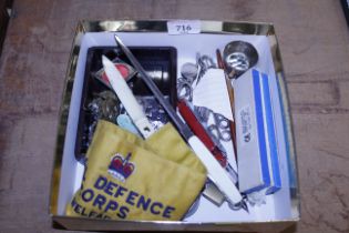 A box containing a Civil Defence Corps Welfare bad