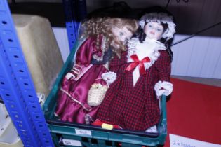 A box of dressed dolls