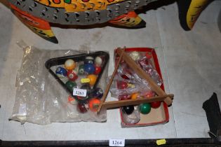 A quantity of snooker and pool balls and accessori