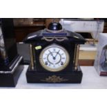 A Victorian marble cased mantel clock