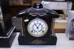 A Victorian marble cased mantel clock