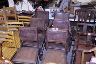 A set of six oak framed and leatherette upholstere