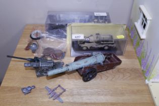 Two vintage model field guns and other military to