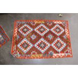 An approx. 4'2" x 2'8" Chobi Kelim rug