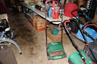 A Qualcast Concorde electric cylinder lawn mower