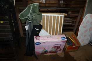 A baby walker, a stair gate, folding chair etc.