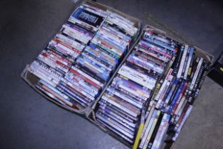 Two boxes of various DVDs