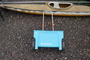 A Gardena garden spreader