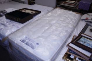 A Sealy single divan and mattress