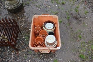 A plastic crate and contents of flower pots