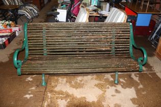A good quality wooden and iron garden bench