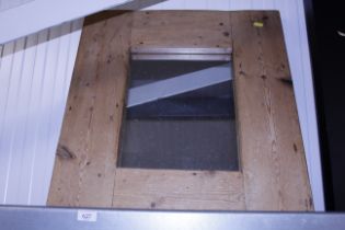 A pine framed wall mirror