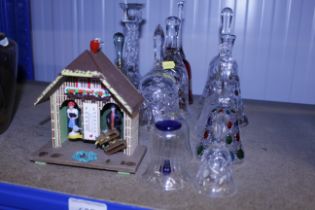 Various glass bells and a thermometer in the form