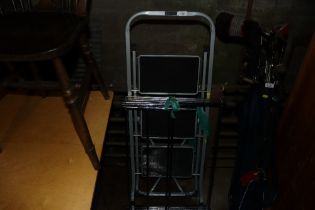 A folding clothes airer and a set of folding three