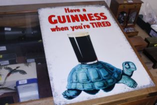 A reproduction sign "Have a Guinness when your tire