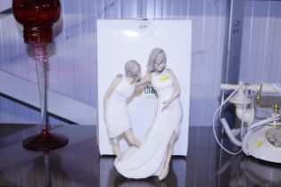 A Daisy Chain Enesco figure group and box