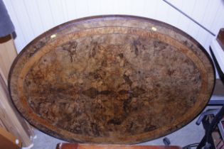 A Victorian burr walnut loo table