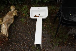 A hand basin on pedestal
