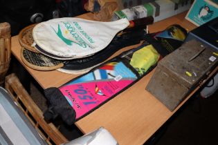 A Comet stunt kite and various tennis rackets