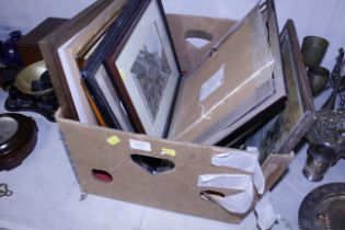 A box of miscellaneous pictures and prints