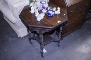 An Edwardian walnut octagonal occasional table