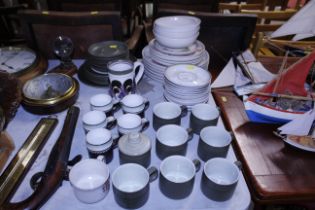 A collection of various Denby pottery