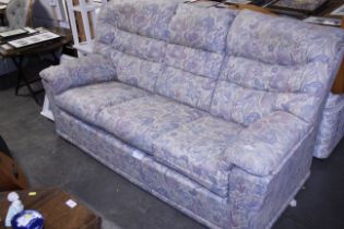 A floral upholstered three seater settee