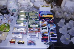 A collection of modern boxed vehicles including Co