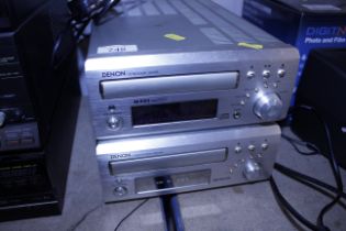 A Denon cassette deck and CD player