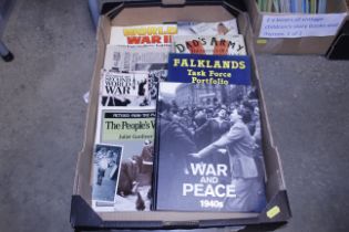 A box of books on war time themes