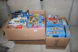 Two boxes of miscellaneous jigsaw puzzles
