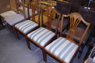 A set of four mahogany Hepplewhite style dining ch