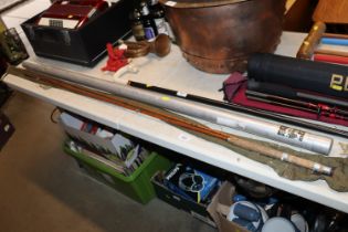 A Hardy fly fishing rod with Hardy's cloth bag and