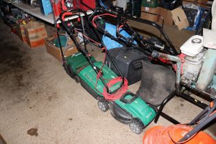 A Qualcast electric rotary lawn mower